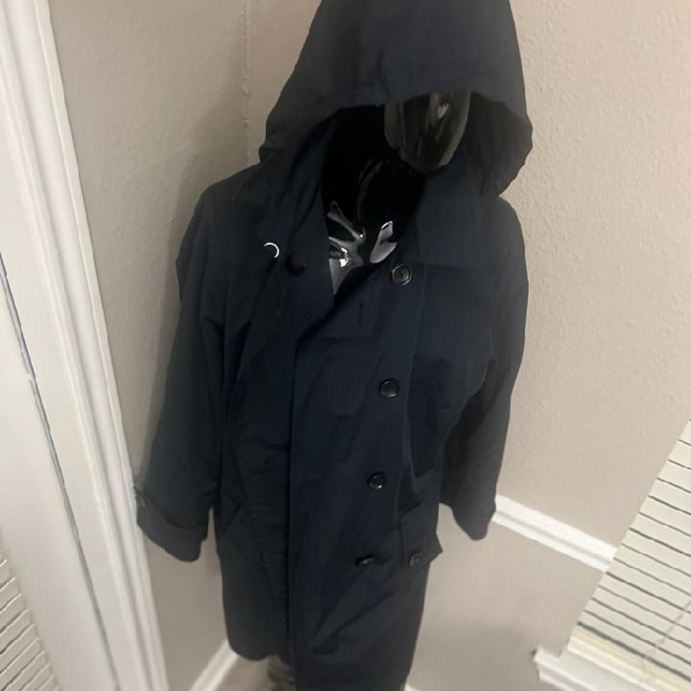 A black Michael Kors Coat